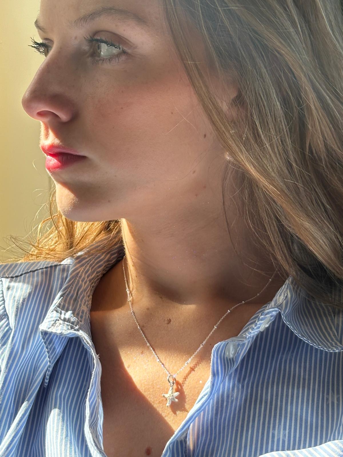 Silver necklace with small starfish