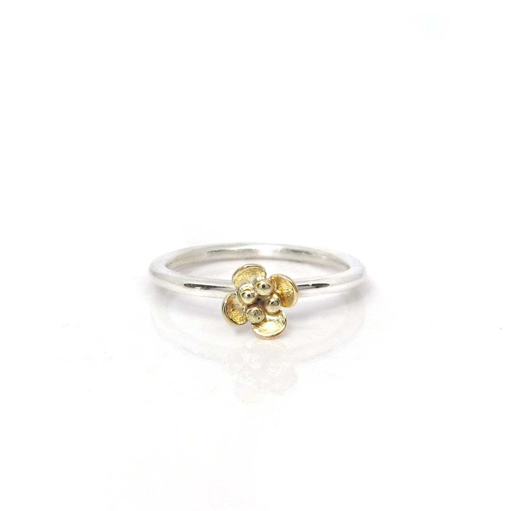 Aanschuifring zilver met gouden bloemetje