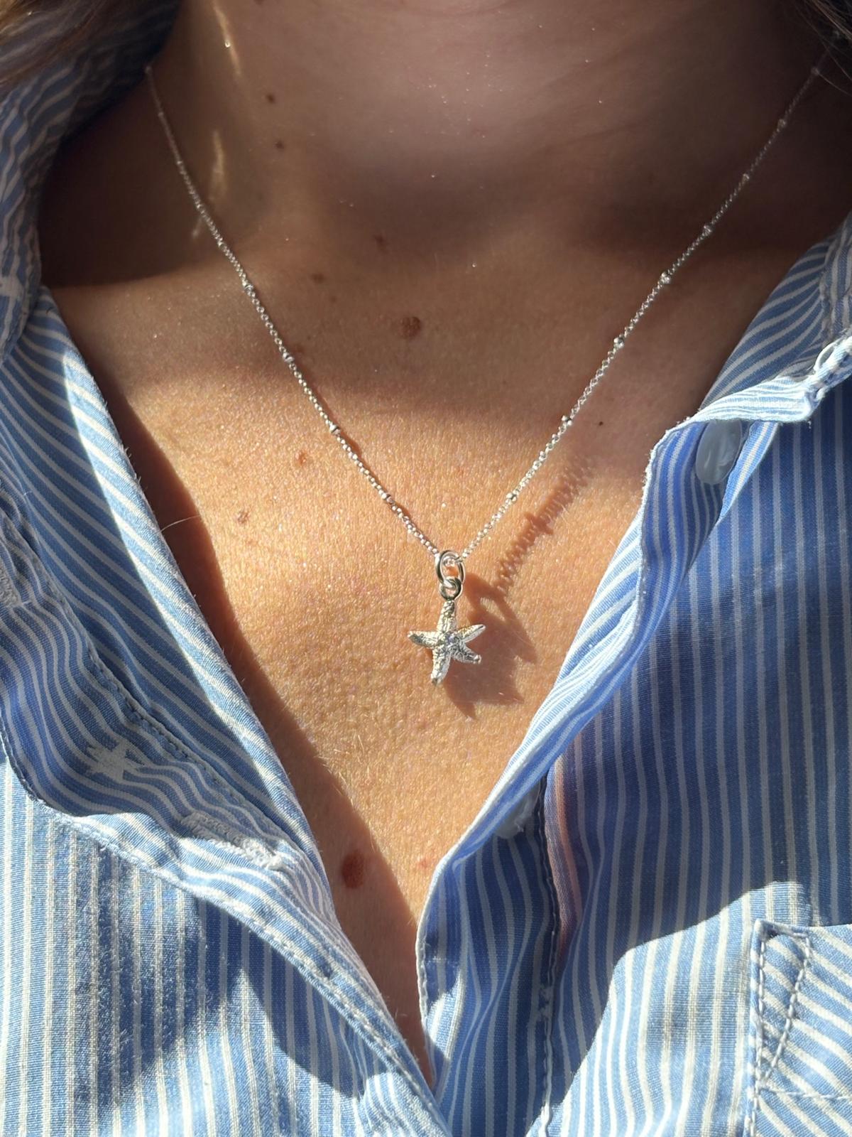 Silver necklace with small starfish