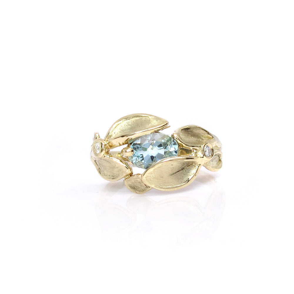 Gold ring with leaves, diamond and aquamarine