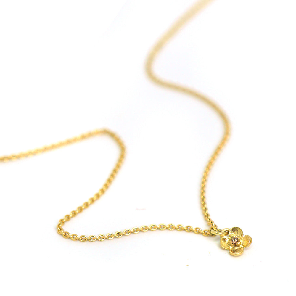 Goldene Blütenkette mit Diamant