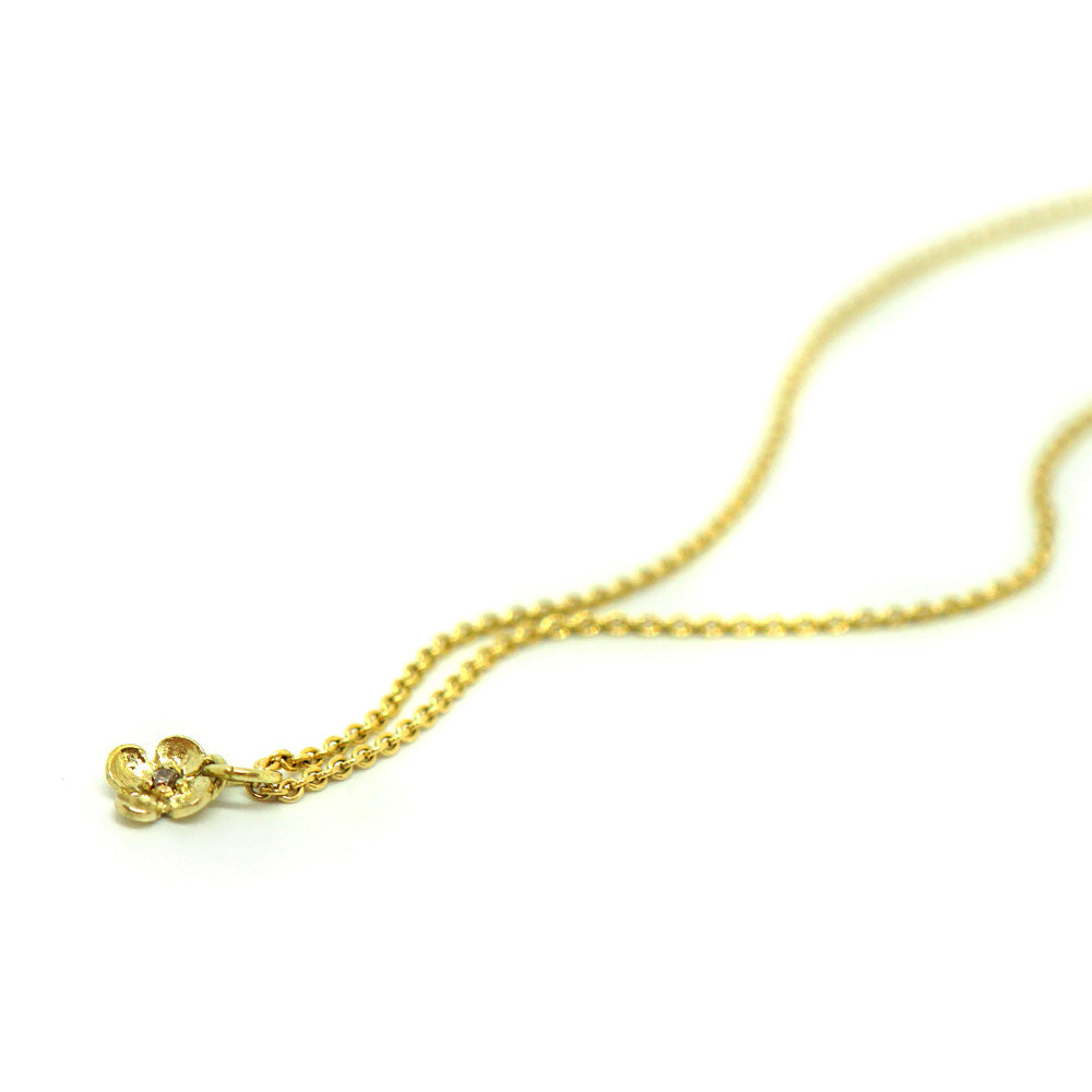 Goldene Blütenkette mit Diamant