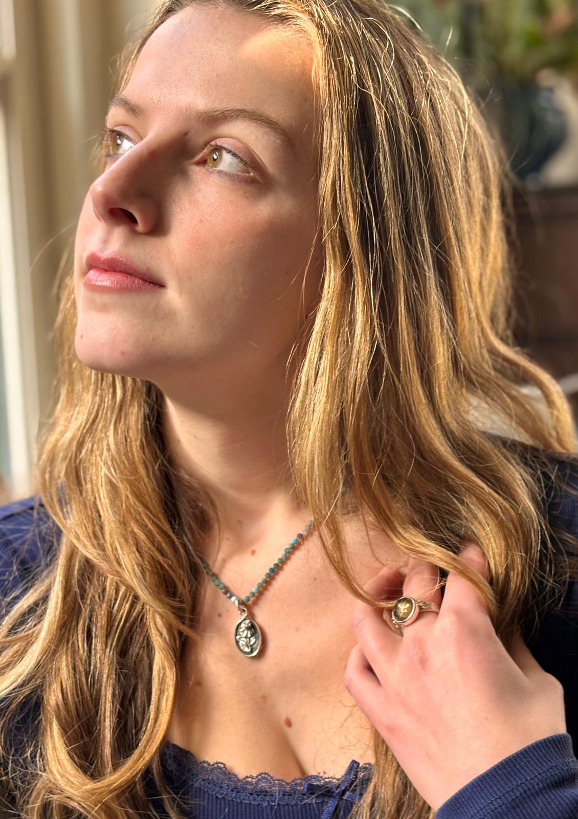 Silver necklace with apatite echinacea