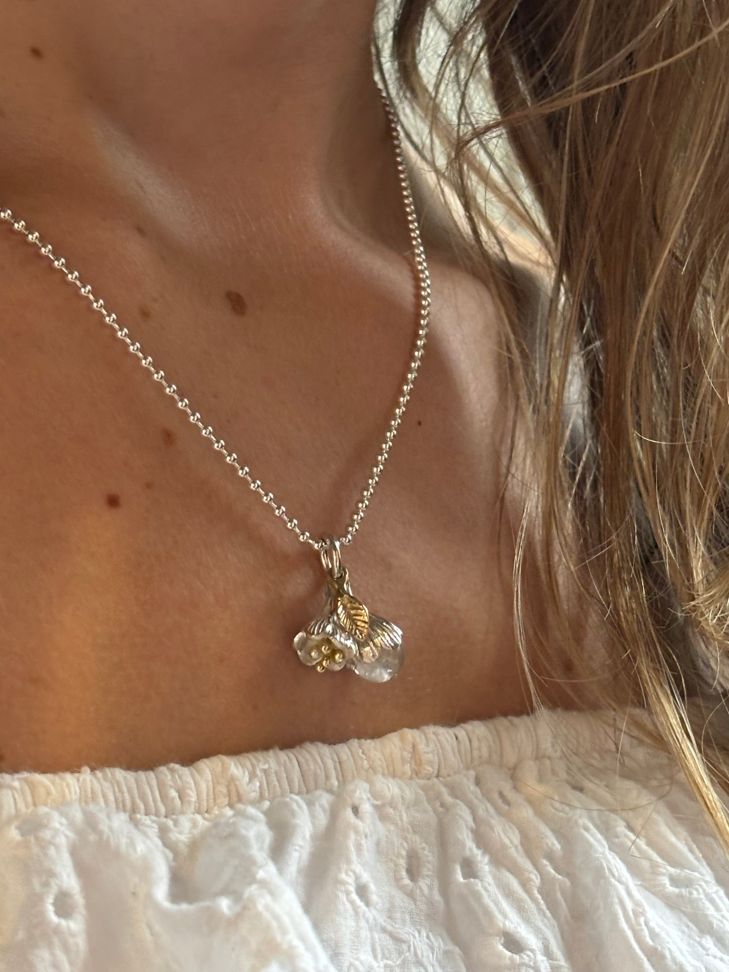 Combinatie flower buds inclusief collier