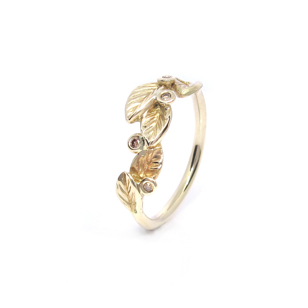 Gold ring with leaves and diamonds