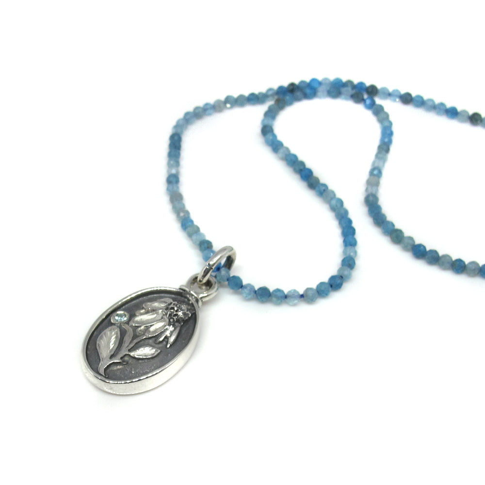 Silver necklace with apatite echinacea