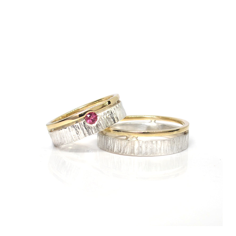 Wedding rings gold with silver hammered