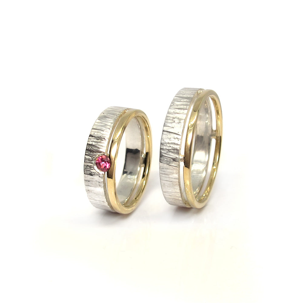 Wedding rings gold with silver hammered