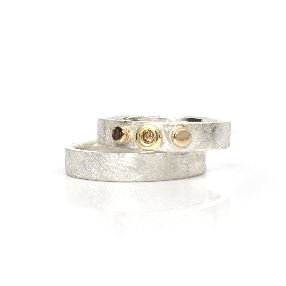 Eheringe aus Gold, Silber und Diamanten