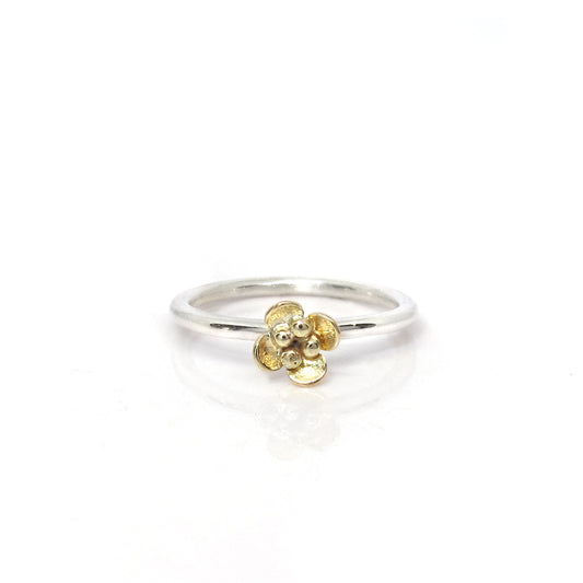 Aanschuifring zilver met gouden bloemetje