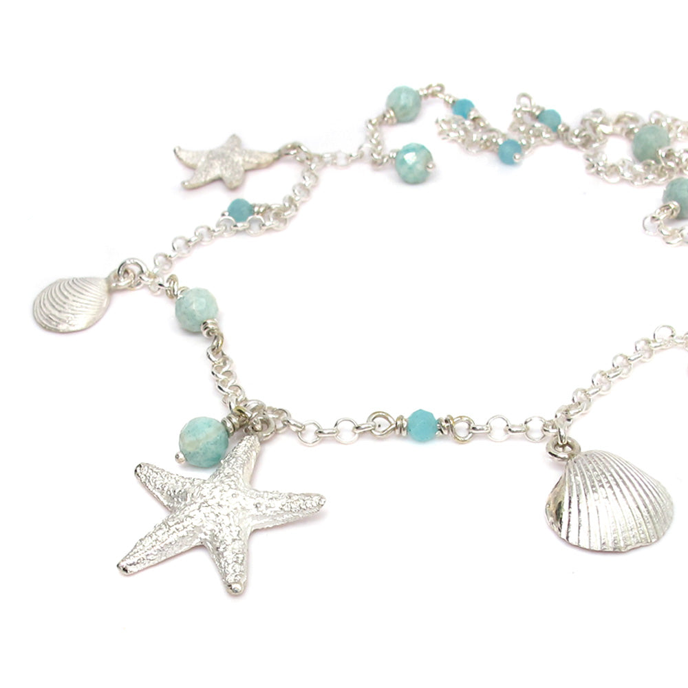 Boho necklace with shells, stars and gemstones
