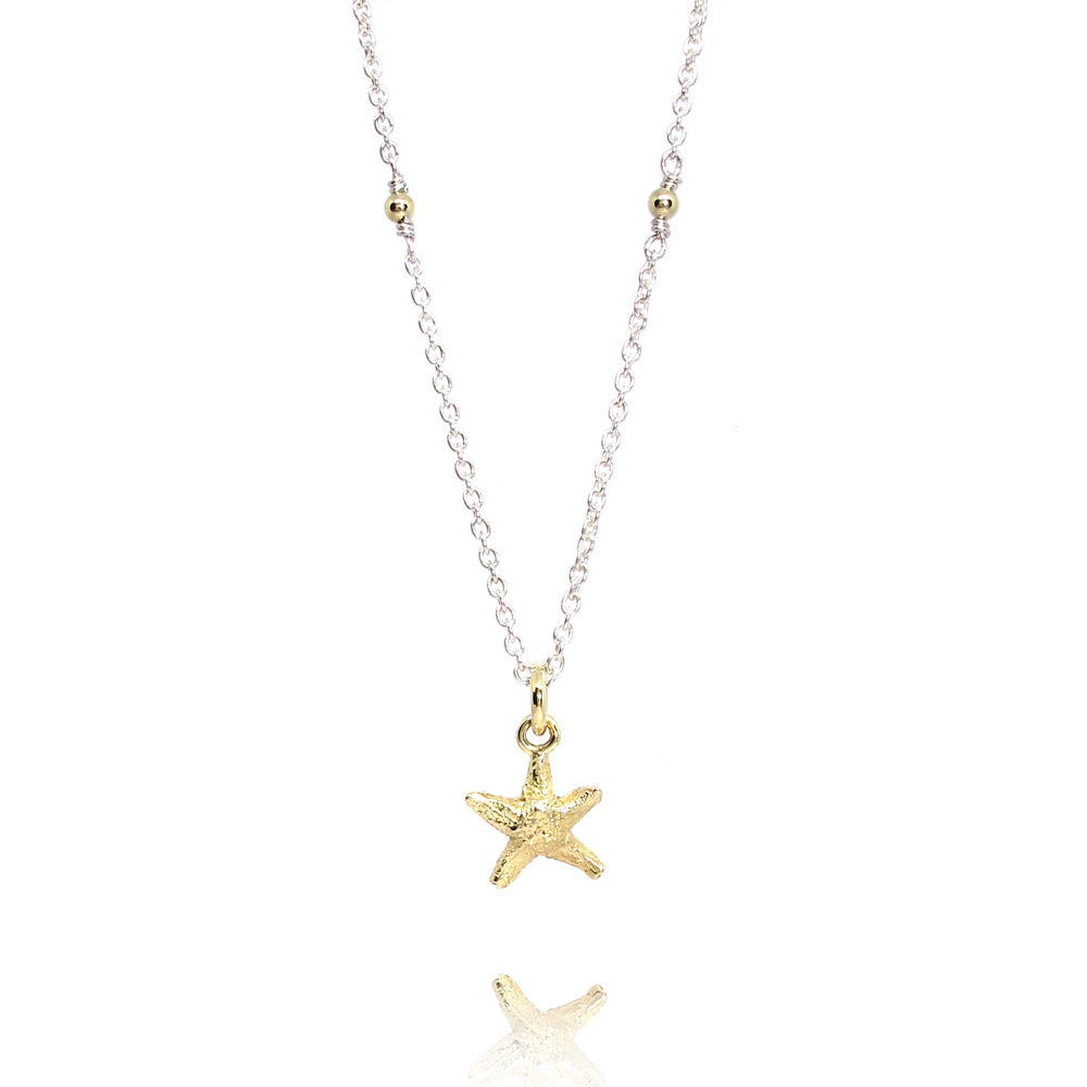 Silberne Halskette mit goldenem Seestern
