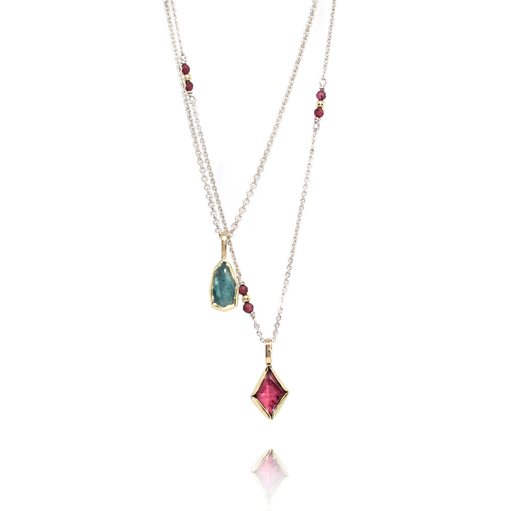 Pendant in gold setting with pink garnet