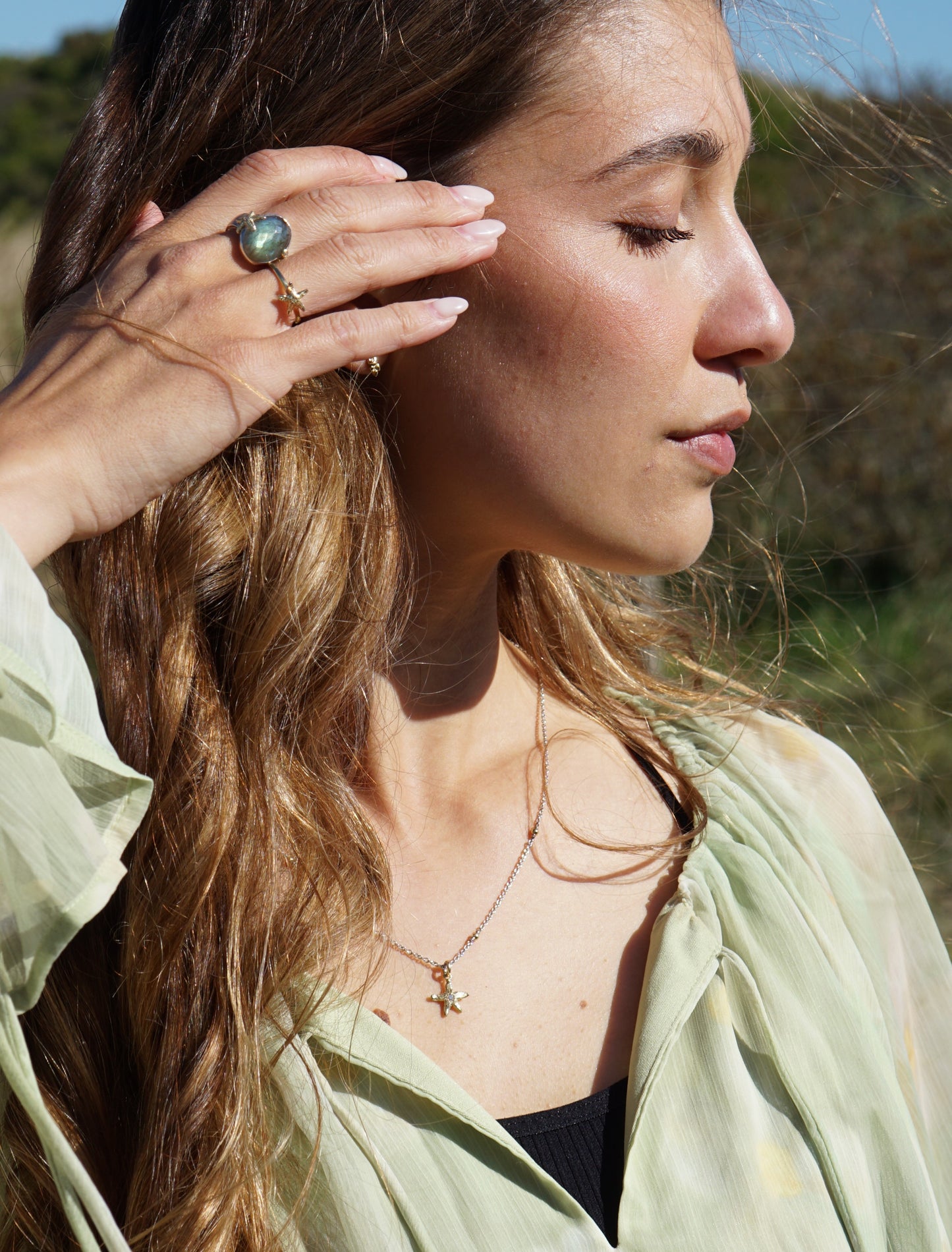 Silver ring with gold starfish, diamonds and labradorite