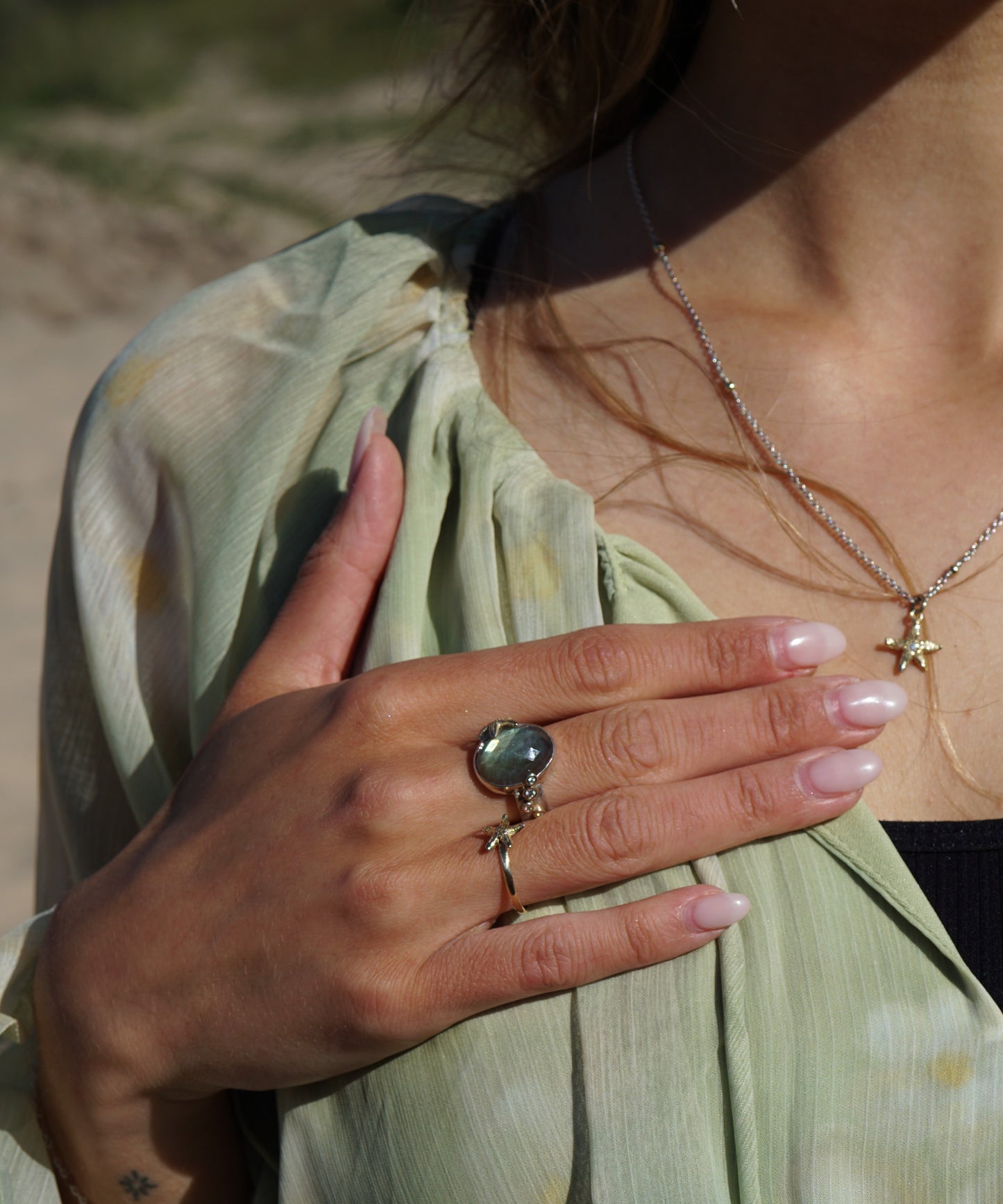Silver ring with gold starfish, diamonds and labradorite