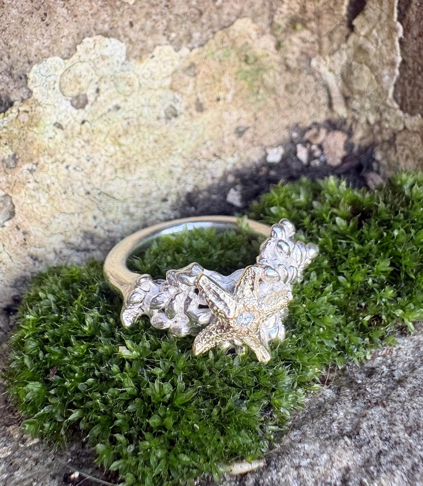 Silberring mit goldenem Seestern und Diamant „Dunes’ Kiss“