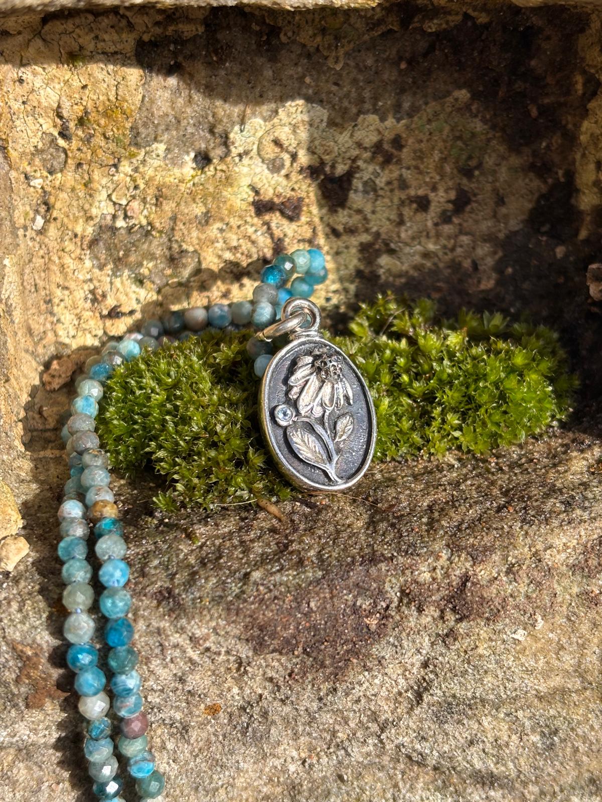 Silver necklace with apatite echinacea
