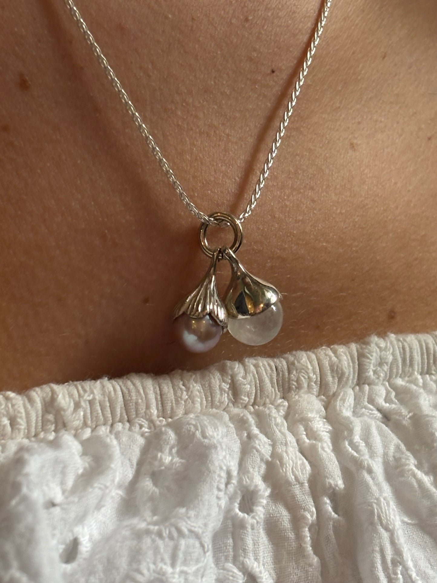 Combinatie flower buds inclusief collier