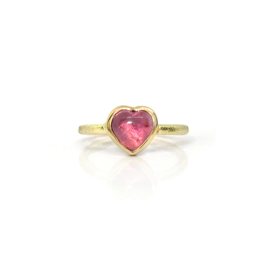 Gold ring with heart-shaped tourmaline stone