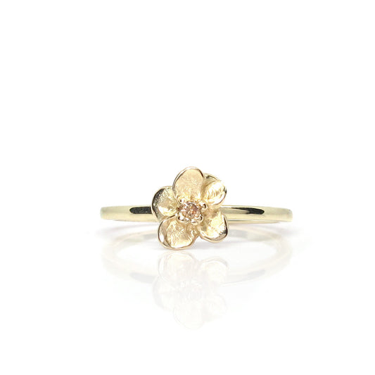 Feiner Goldring mit Blume und Diamant