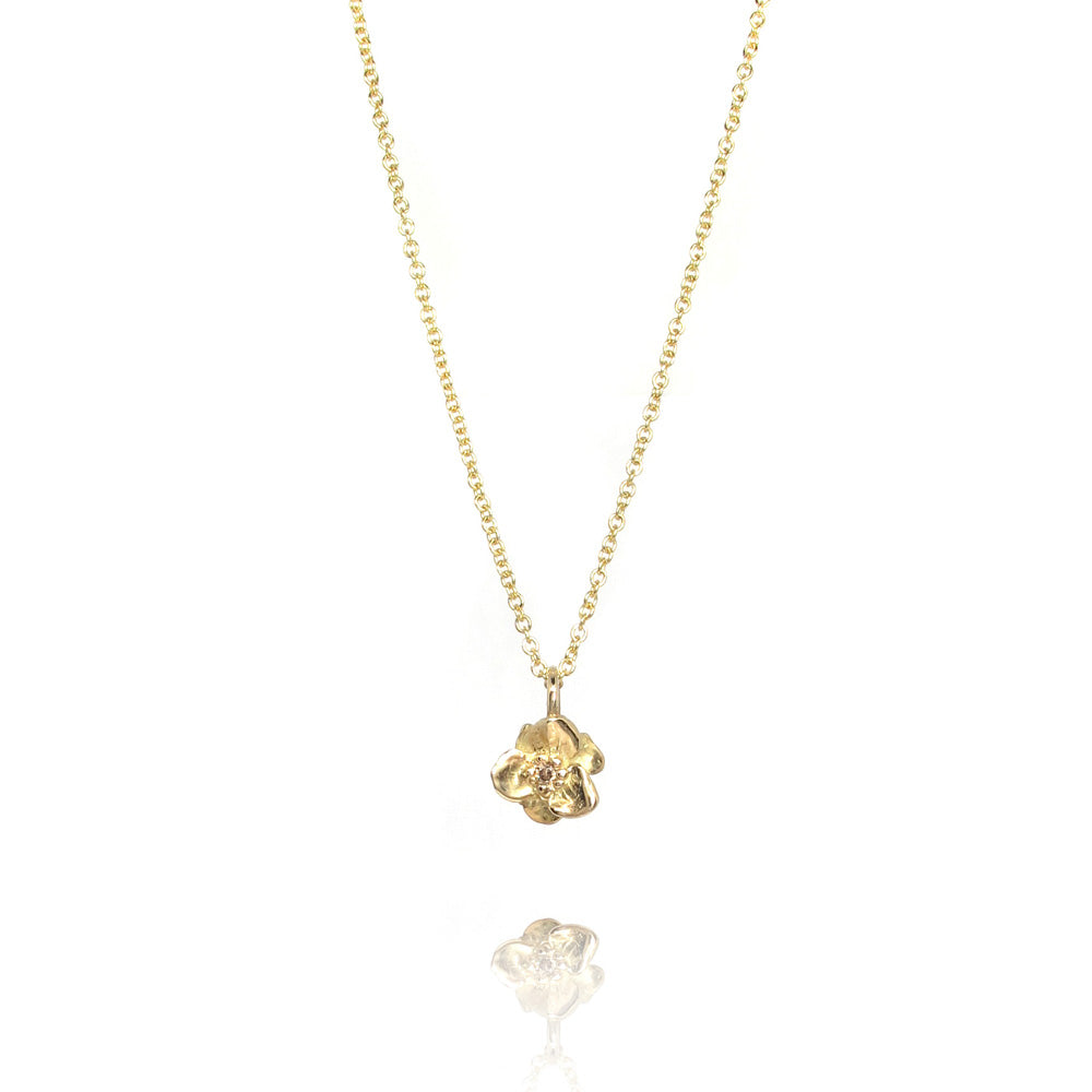 Goldanhänger mit Blume und Diamant