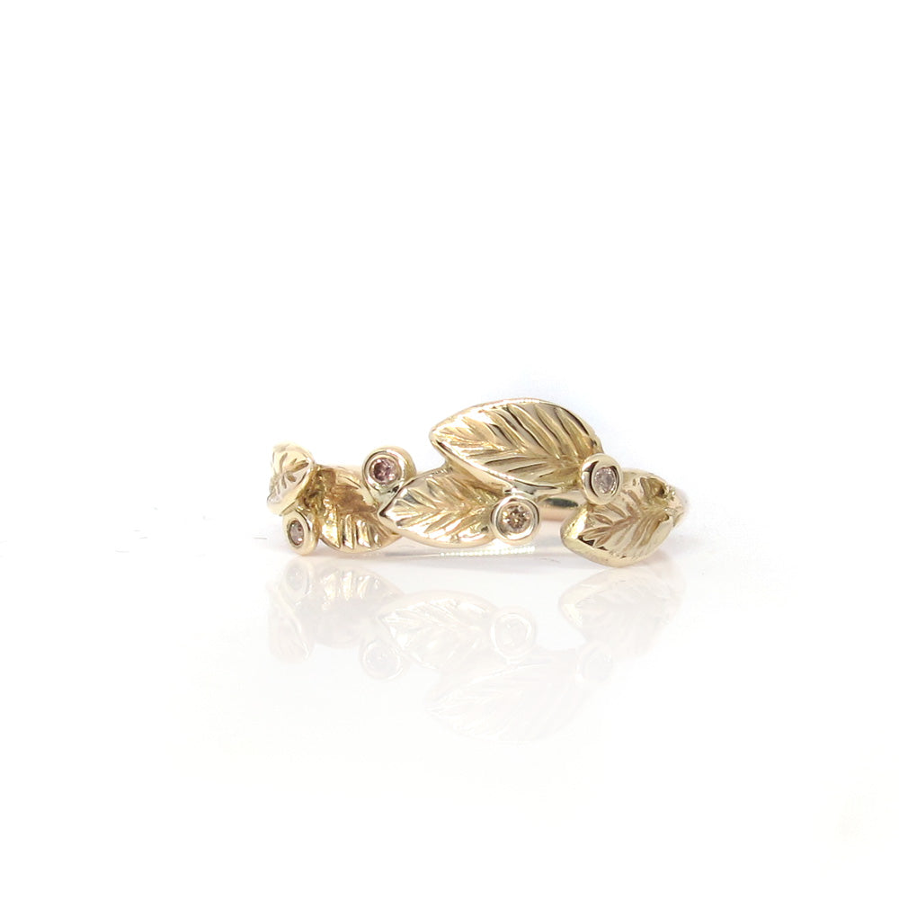 Gold ring with leaves and diamonds