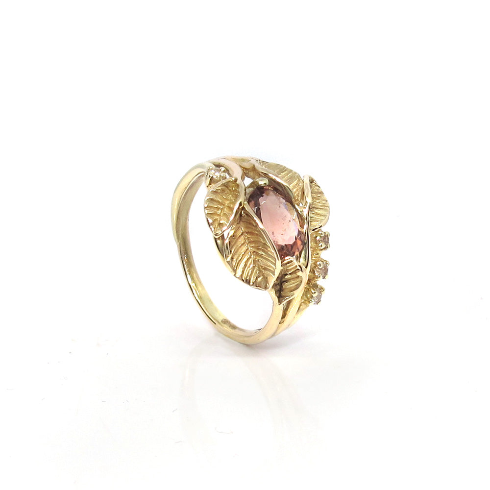 Gold ring with tourmaline and diamond