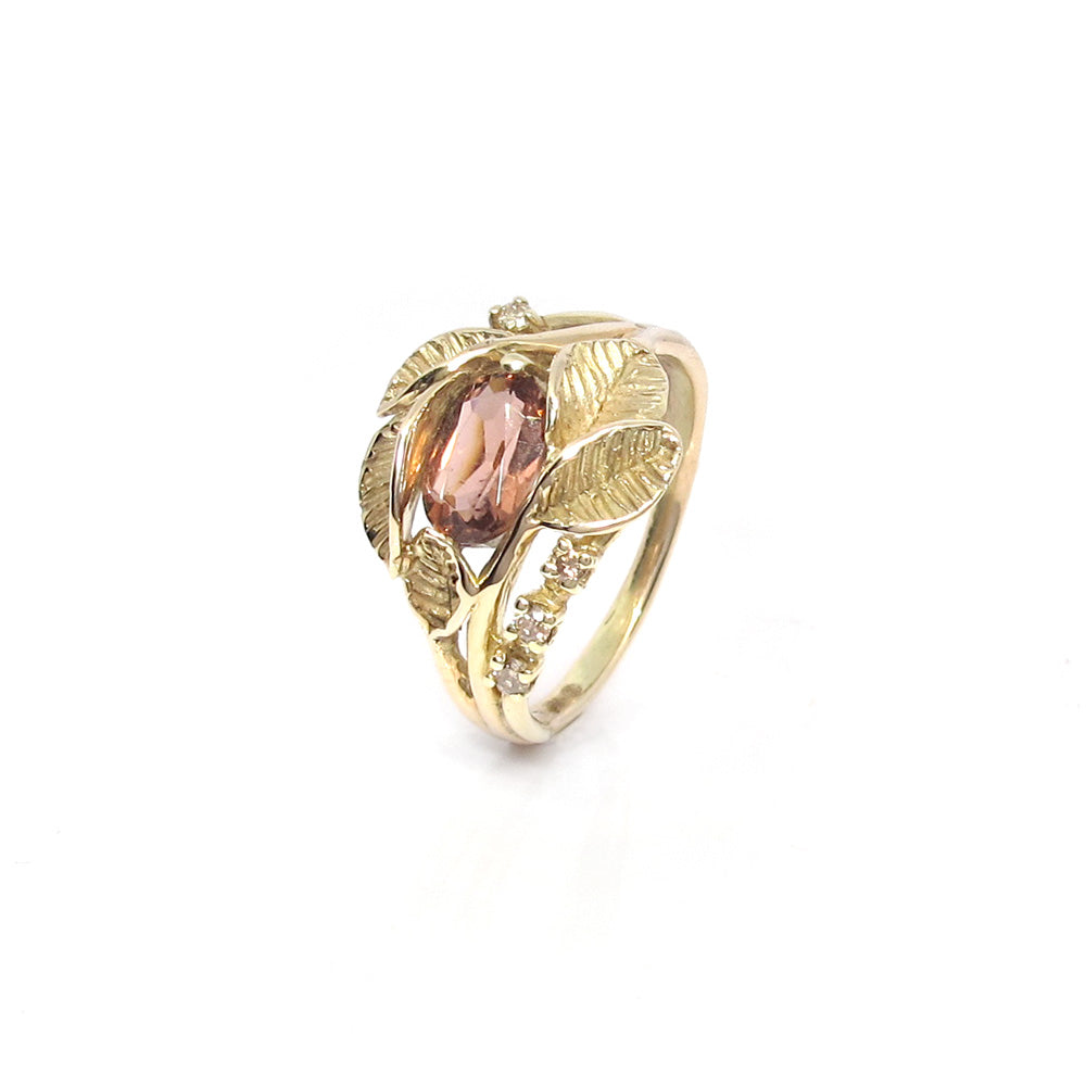 Gold ring with tourmaline and diamond