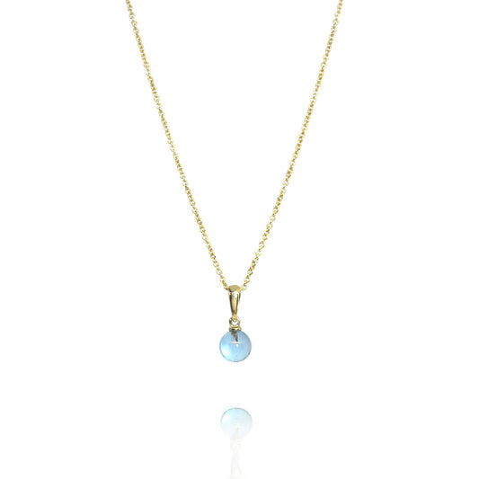 Gold necklace with topaz pendant