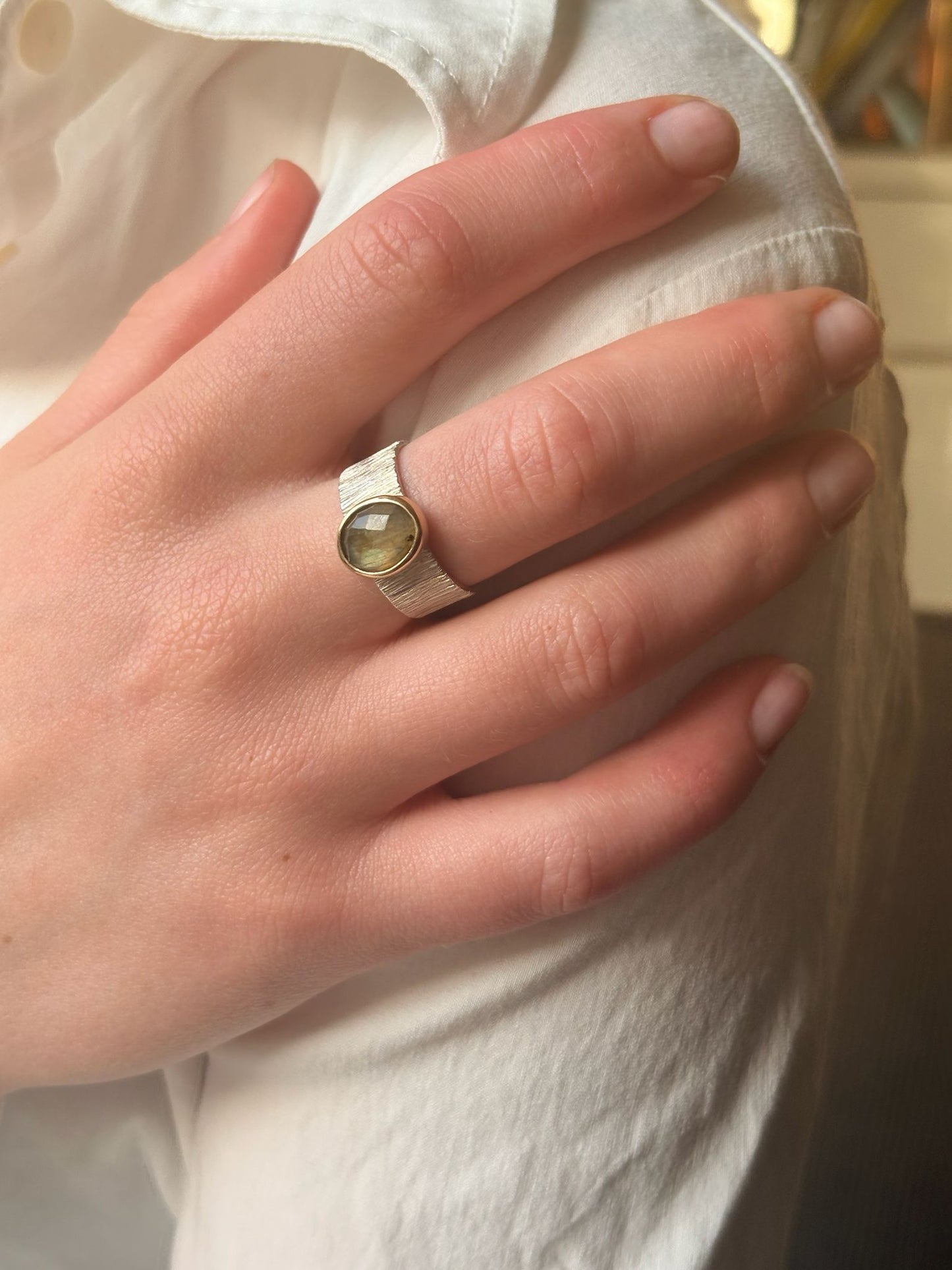Silver ring with gold and labradorite