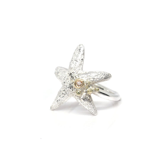 Silberner Seesternring mit goldenen Details