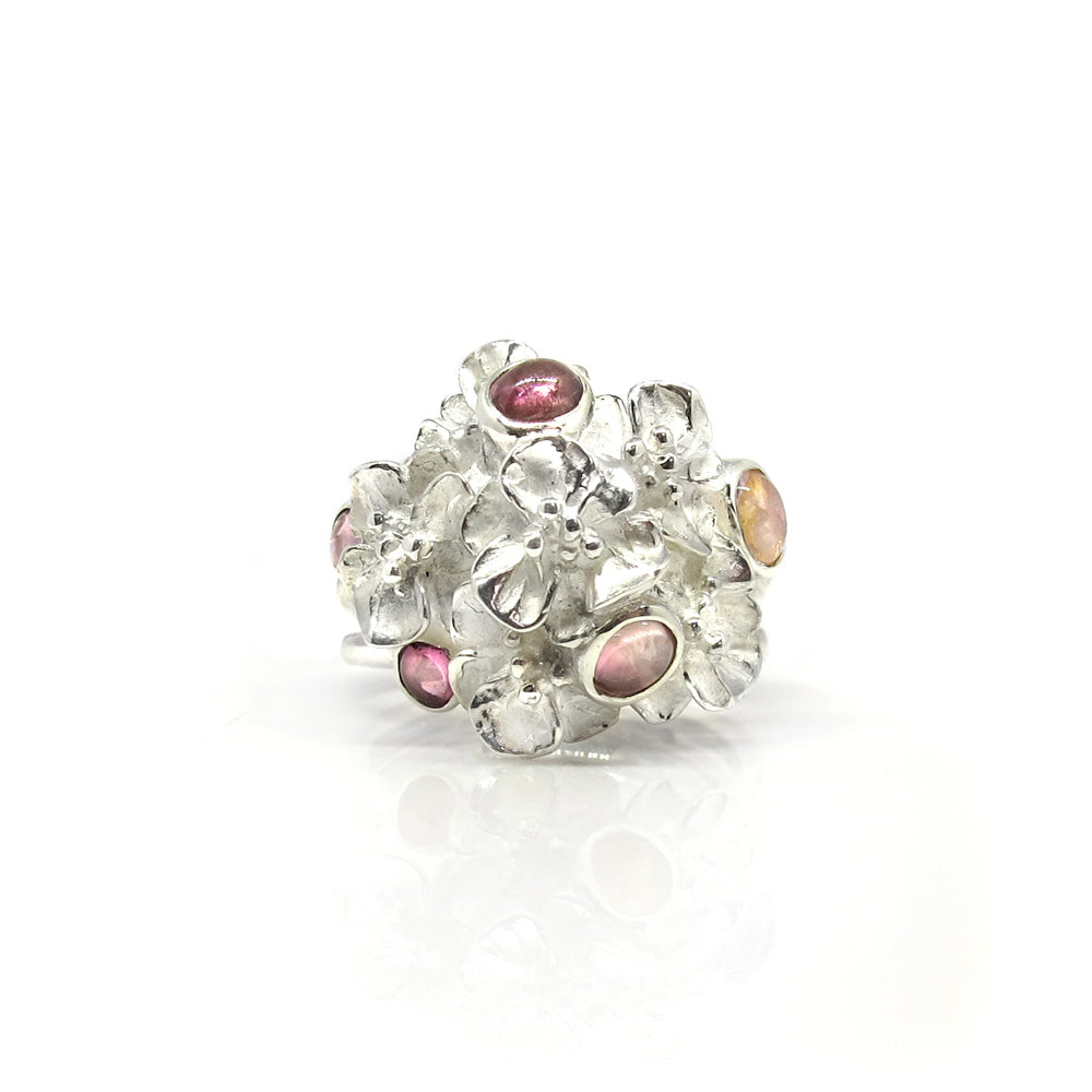 Silver flower ring with pink tourmaline