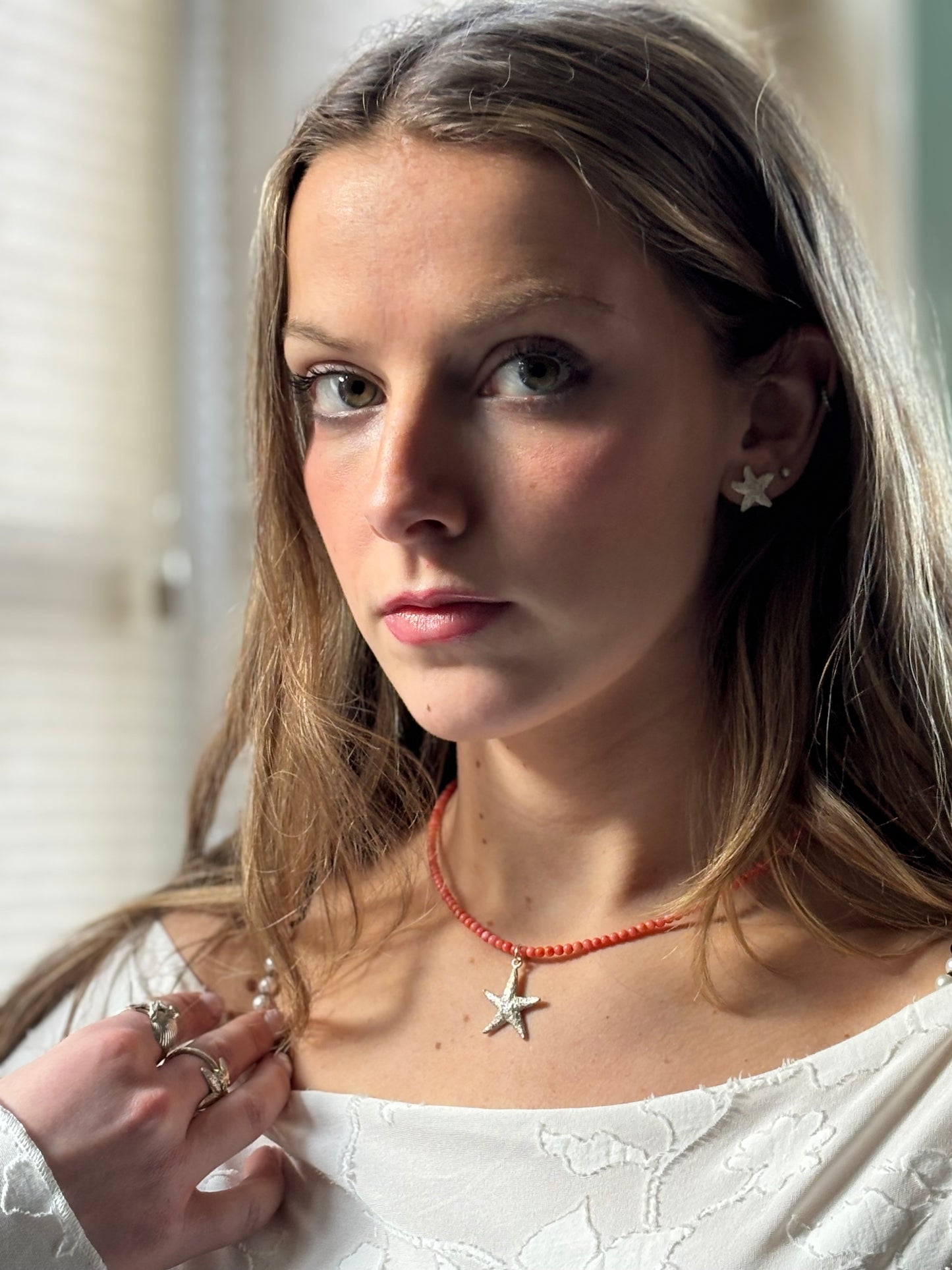 Coral necklace with silver starfish