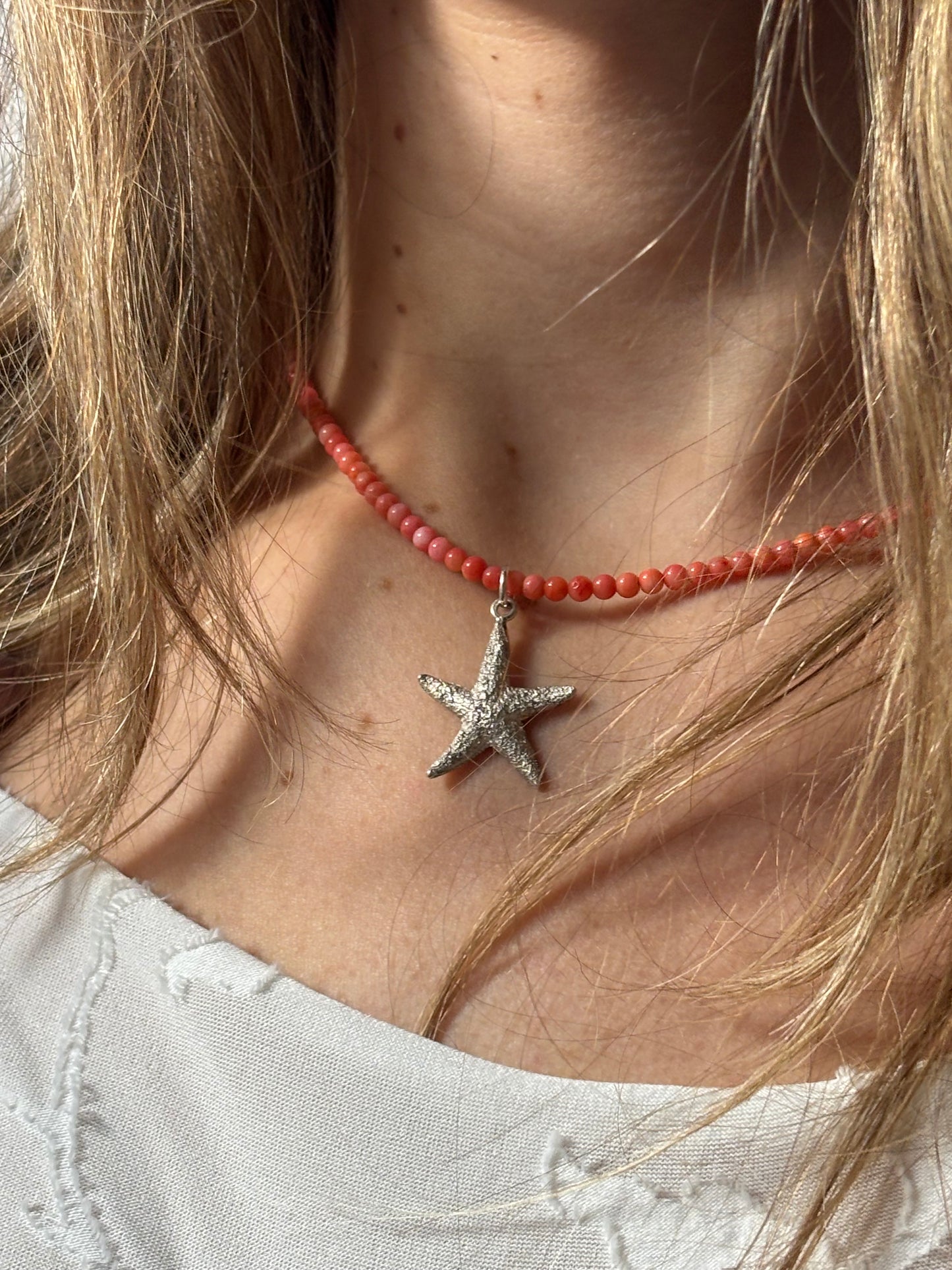 Coral necklace with silver starfish